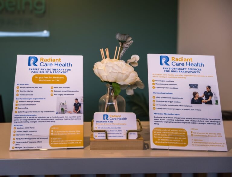 Reservoir clinic reception desk with Radiant Care Health brochures, business cards and decorative vase